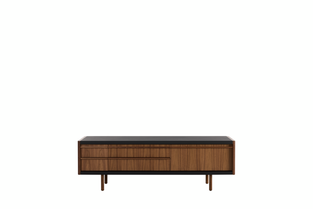 New Canaan Media Unit designed by BassamFellows for Geiger in Walnut with Black Leather shown in front view on a white sweep.