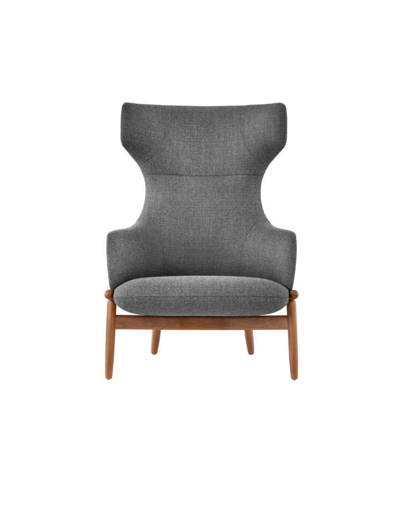 A wing-back Reframe Lounge Chair in Milaner Charcoal, viewed from the front.