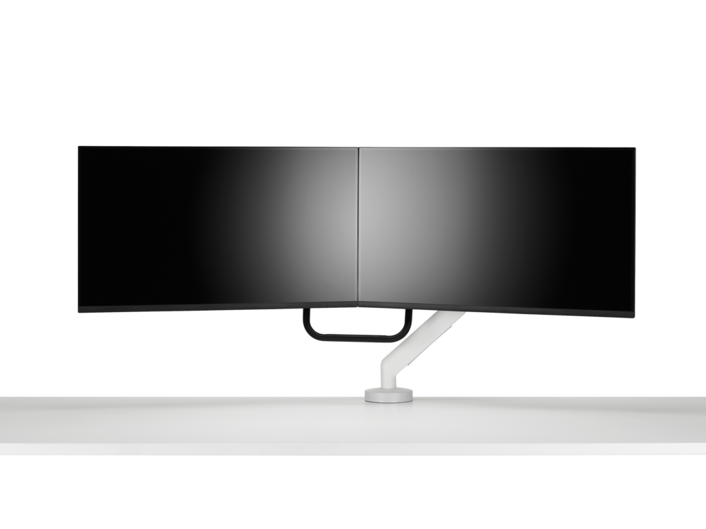 White dual Flo X monitor arm set up with 32'' screens, viewed from the front