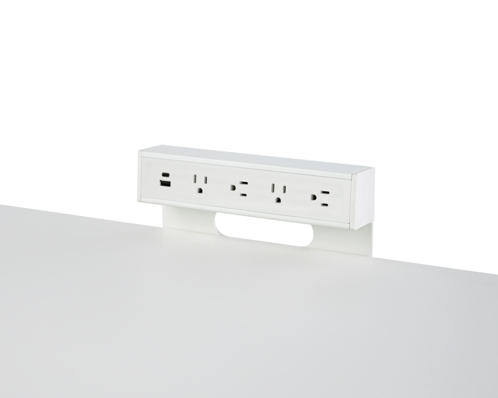 USB-A port, USB-C port, and four A/C power outlets on an attached table power source.