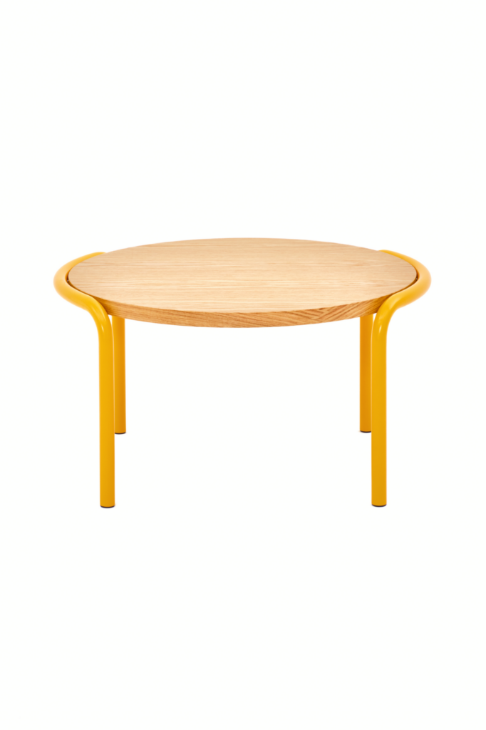 A front view of a round Sweep Table with oak top and yellow frame.