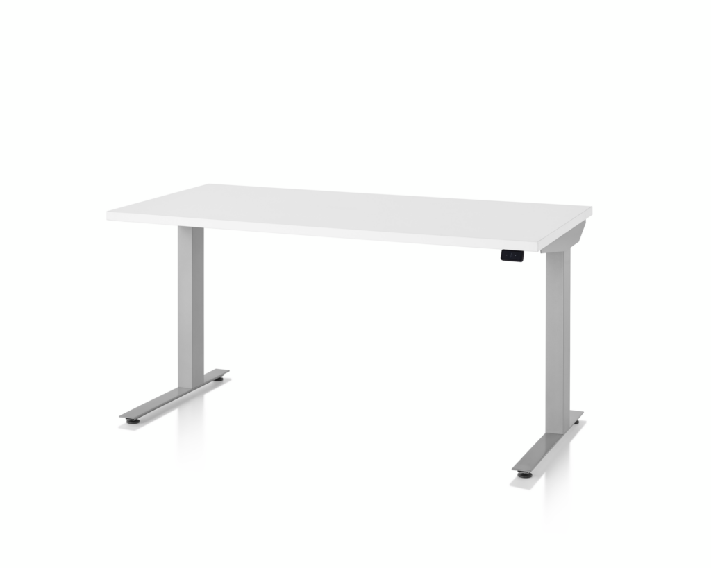 A three-quarter view of a white top, silver leg, Nevi Sit-to-Stand Table at a seated height.