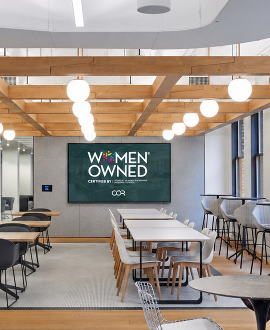 COR office with the WOMEN OWNED certification displayed on screen