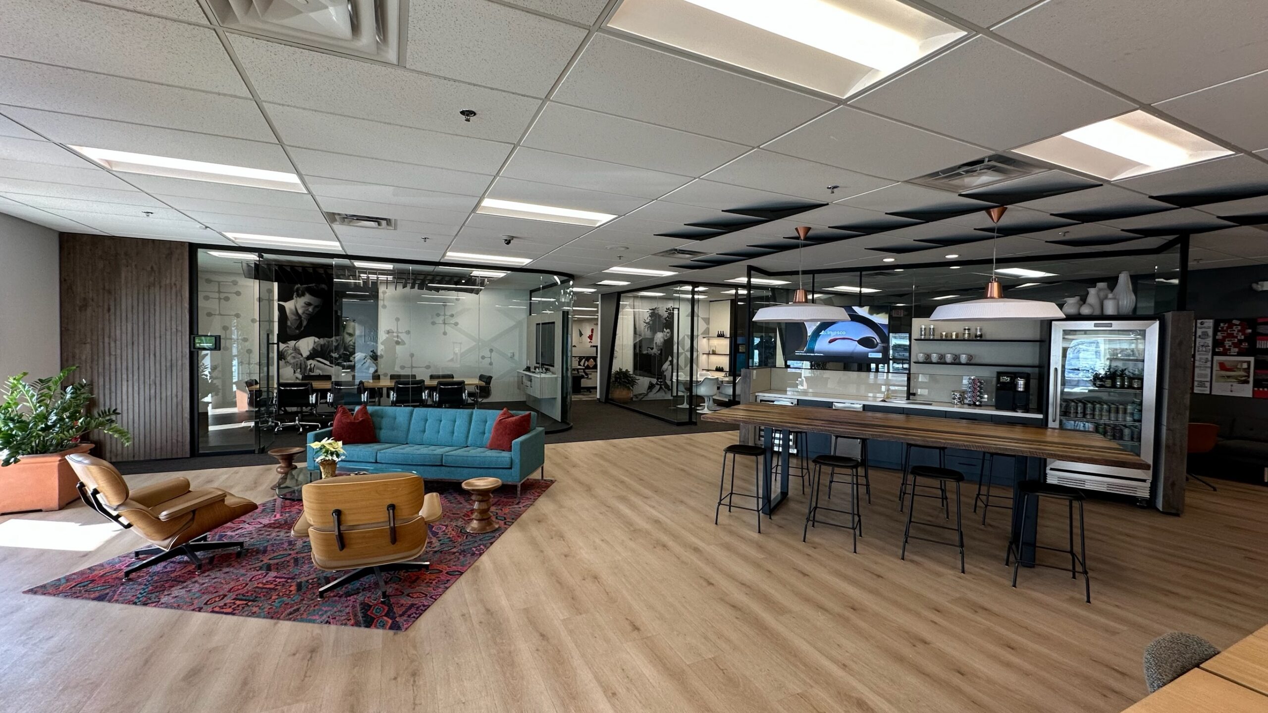 A COR showroom floor with lounge seating and a bar-height work counter